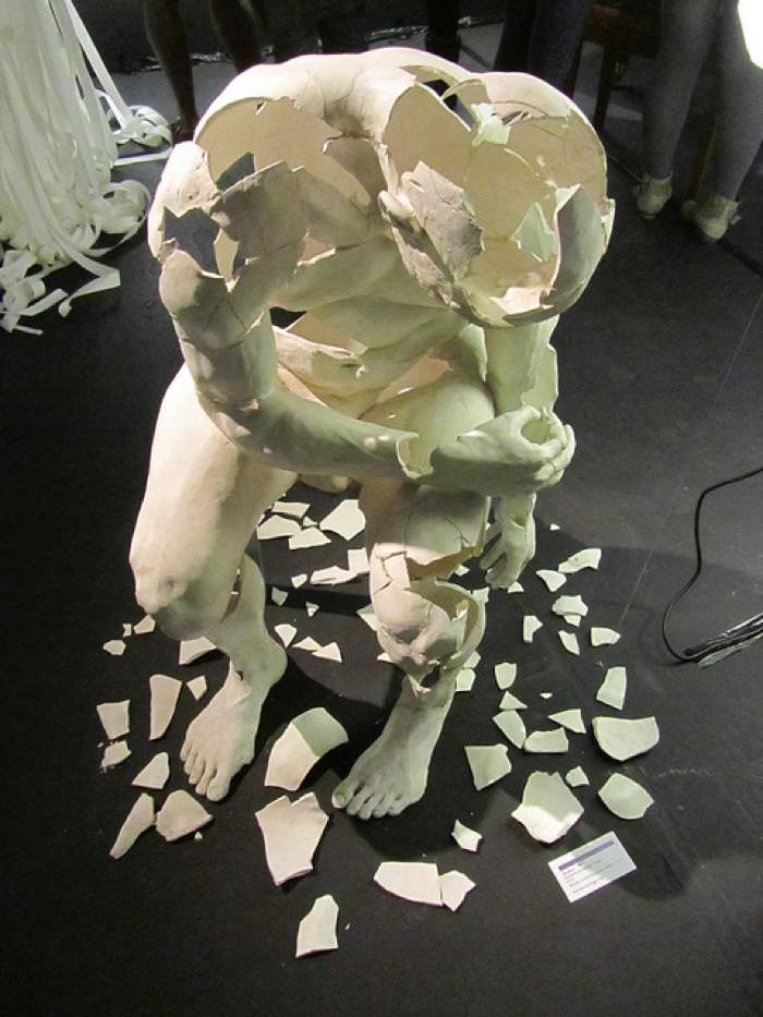 Shattered man at museum of broken relationships